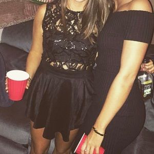 Black sparkly romper